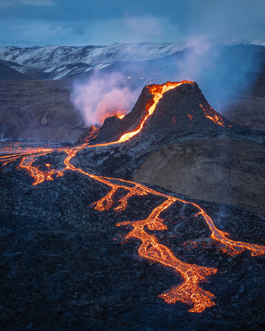 Rock cycle visual: Image of active volcano, common structure formation of igneous rocks.